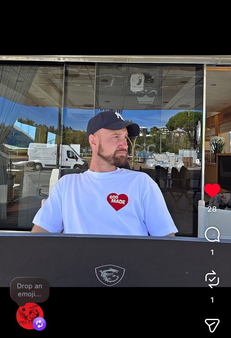 Customer wearing God Made tee